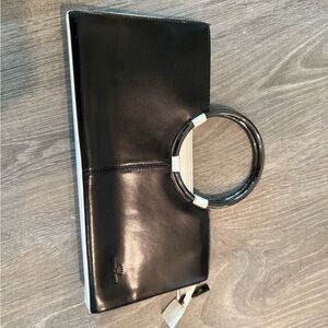 Elegant Daniela Moda Black Leather Clutch with Circular Handle Like New